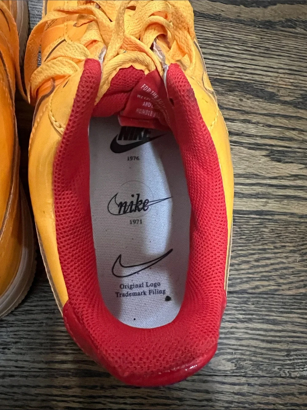 Nike Yellow Sneakers with Red Lining
